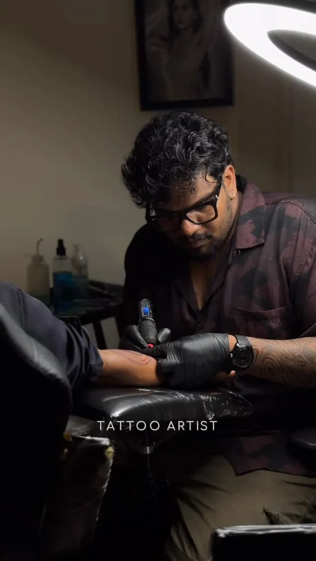 Aswa at his station in The Inkman Tattoo Studio, Calicut